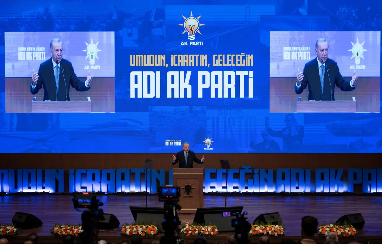 Turkish President Tayyip Erdogan addresses his supporters during a meeting in Ankara