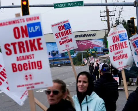 Boeing is reducing executive pay and furloughing nonunion workers during the strike