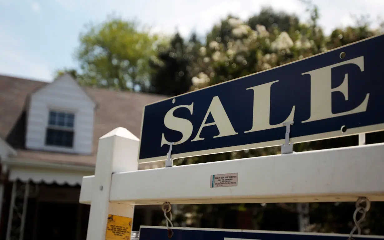 A sale sign advertises a home in Alexandria, Virginia