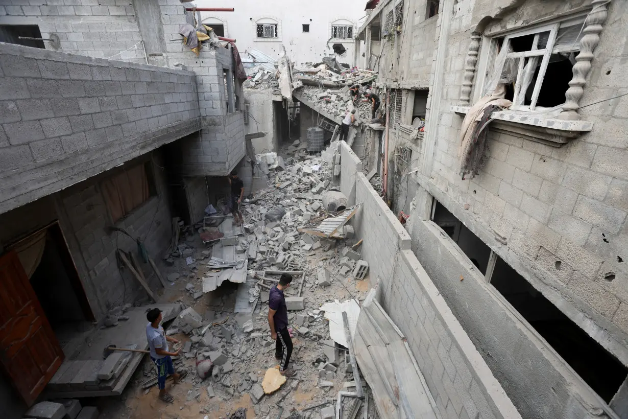 Aftermath of an Israeli strike on a house in Nuseirat in the central Gaza Strip