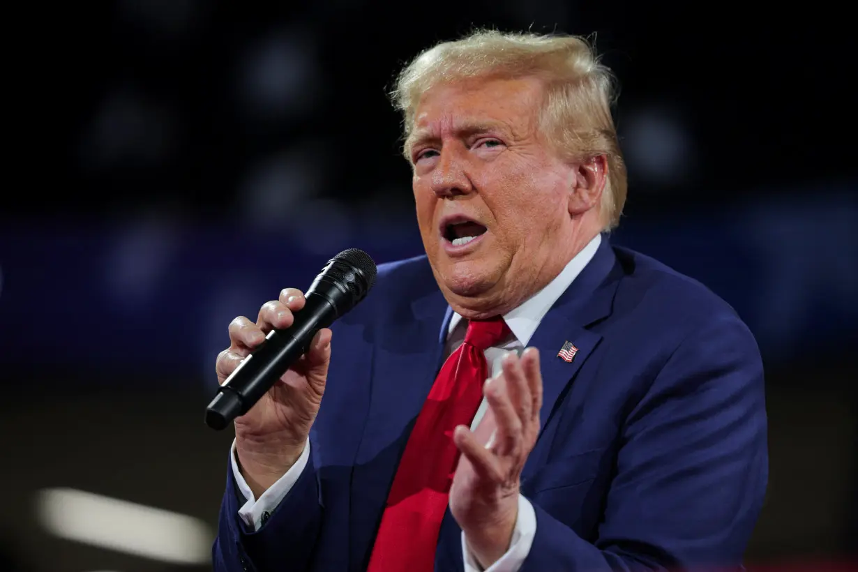 FILE PHOTO: Republican presidential nominee and former U.S. President Trump holds a campaign town hall meeting in Flint