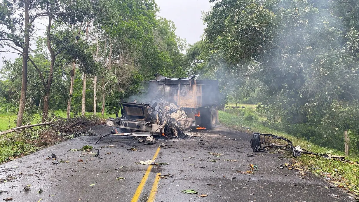 A truck loaded with explosives used in an attack attributed to ELN guerrillas against a military base, burns in Puerto Jordan