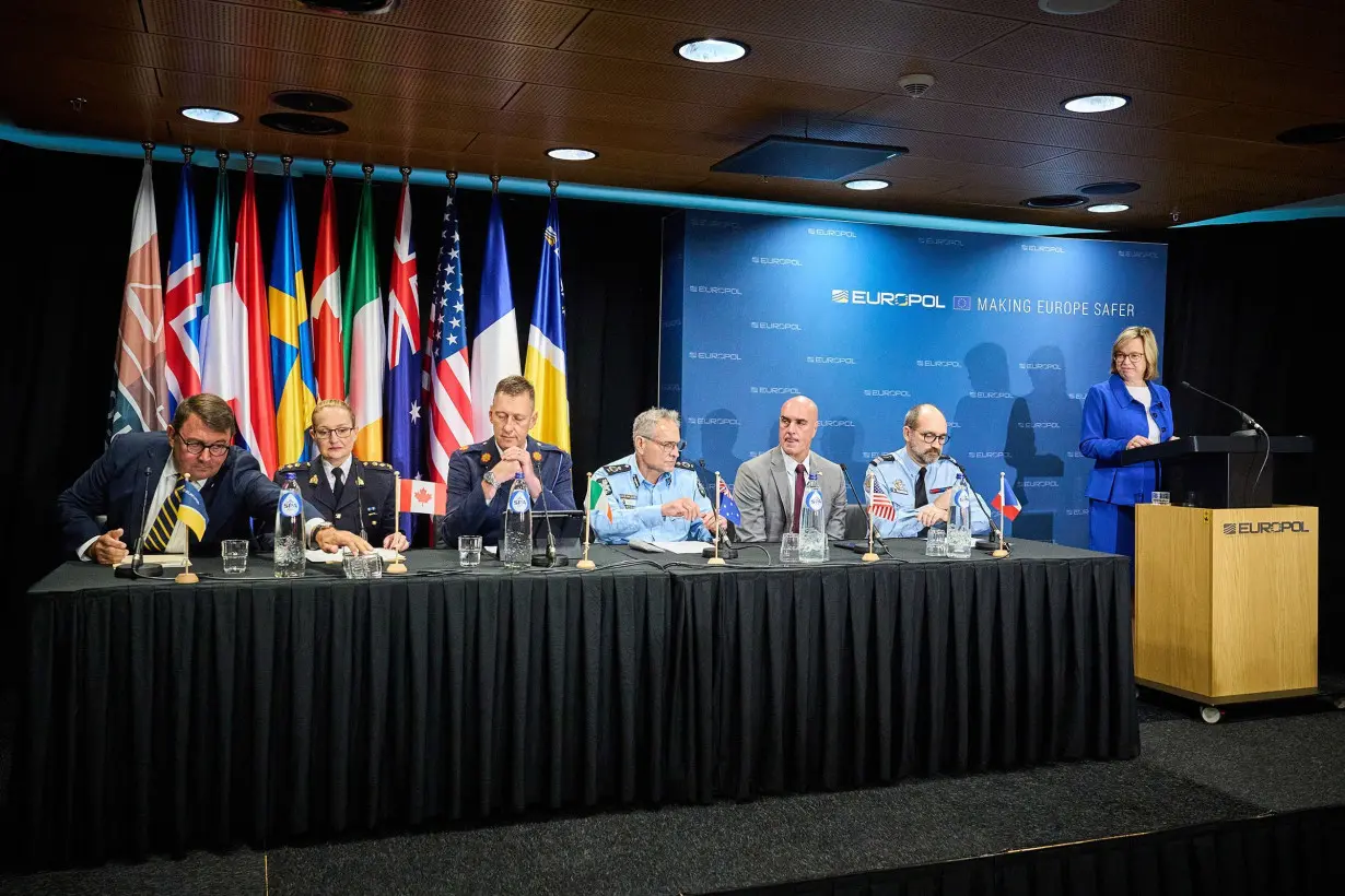 An international coalition of law enforcement representatives including Europol held a news conference announcing their operation against the Ghost app in The Hague on September 18.