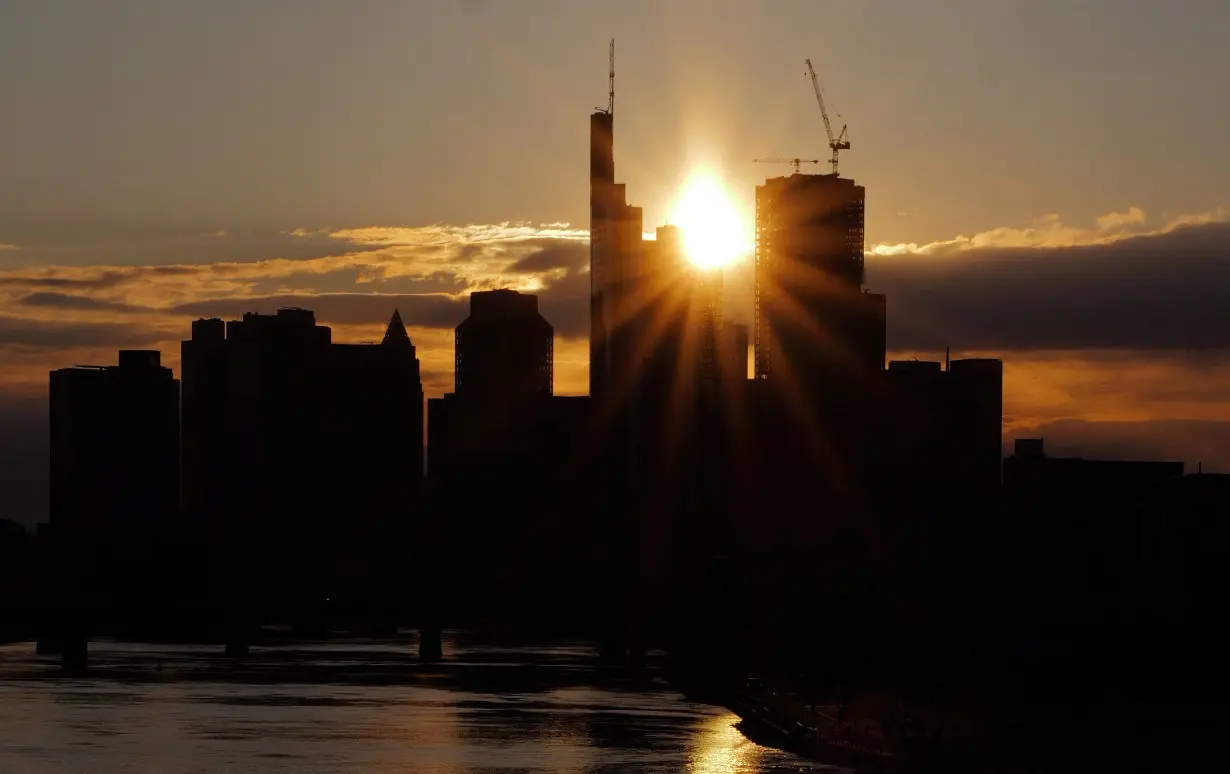 The skyline of the banking district is seen during sunset in Frankfurt