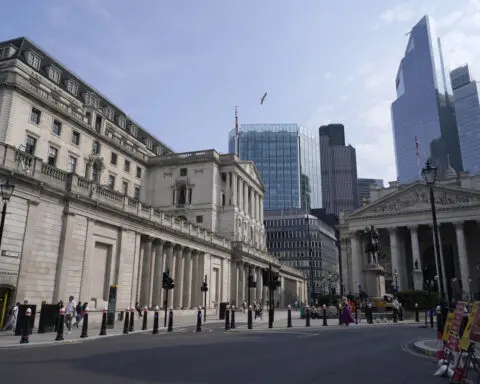 Bank of England keeps its main interest rate on hold at 5% in wake of big US Fed rate cut