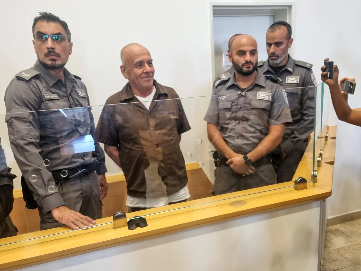 Moti Maman stands in a courtroom after he was accused by Israeli security services of involvement in an Iranian-backed assassination plot targeting prominent people including Israeli PM Netanyahu, in Beersheba