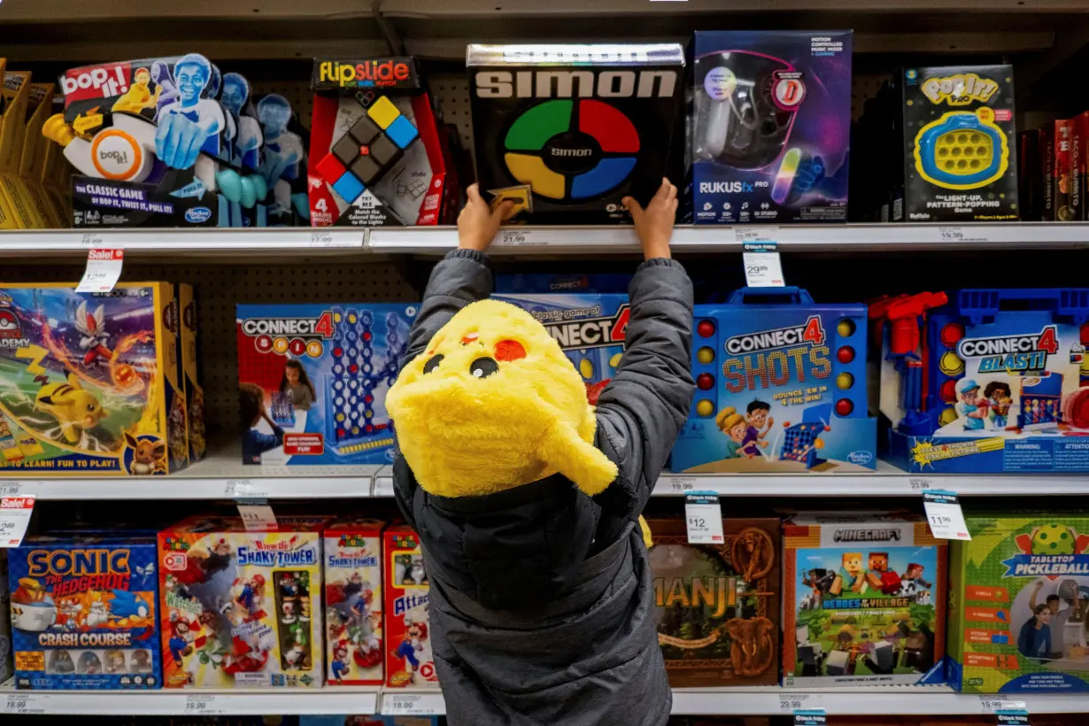 Shoppers converge in a Target store ahead of the Thanksgiving holiday