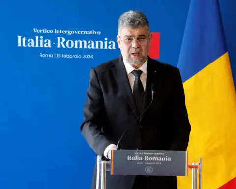 Romanian PM and former NATO official lead tight presidential race - poll