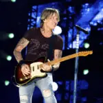 Keith Urban says 'High' is about order and chaos, with songs about love, life and his late father