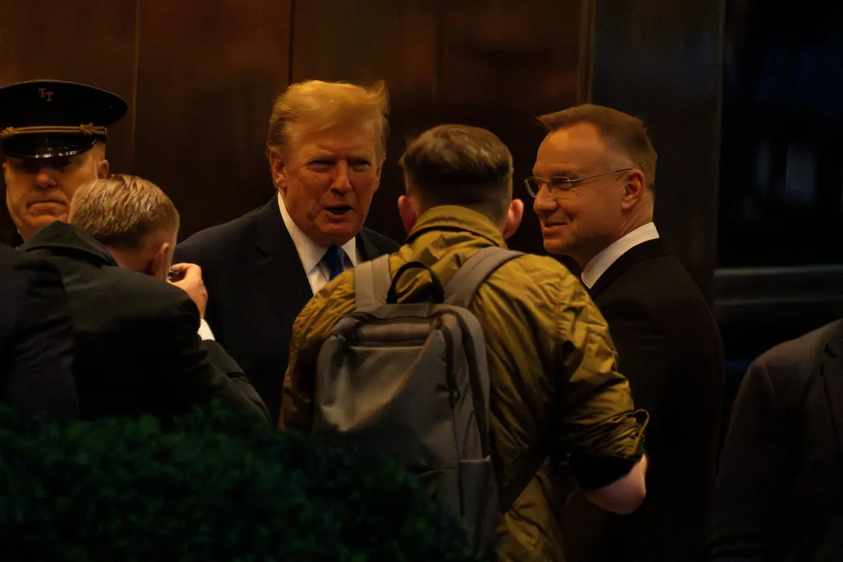 FILE PHOTO: Republican presidential candidate and former U.S. President Donald Trump greets Polish President Andrzej Duda at Trump Tower in New York