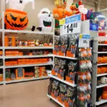 Halloween shoppers hunt for early deals while total spending eases, survey shows