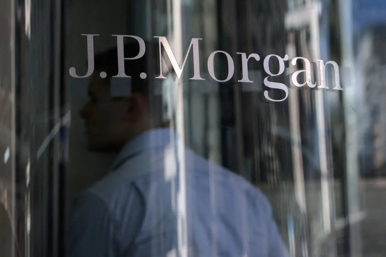 FILE PHOTO: A person enters the JPMorgan Chase & Co. New York Head Quarters in Manhattan, New York City