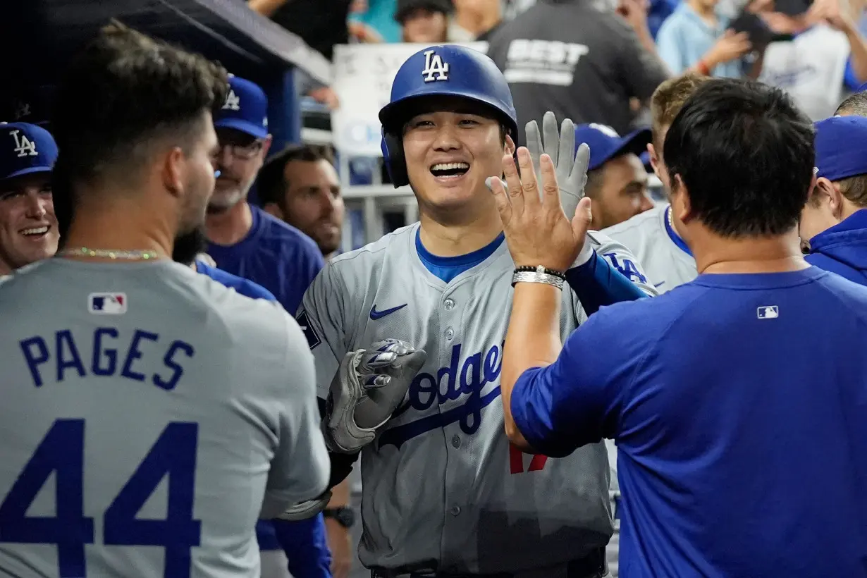 Los Angeles Dodgers' Shohei Ohtani becomes first player to join 50/50 club