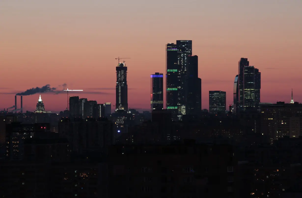 FILE PHOTO: A general view shows the skyscrapers of the Moscow International Business Centre during sunrise in Moscow