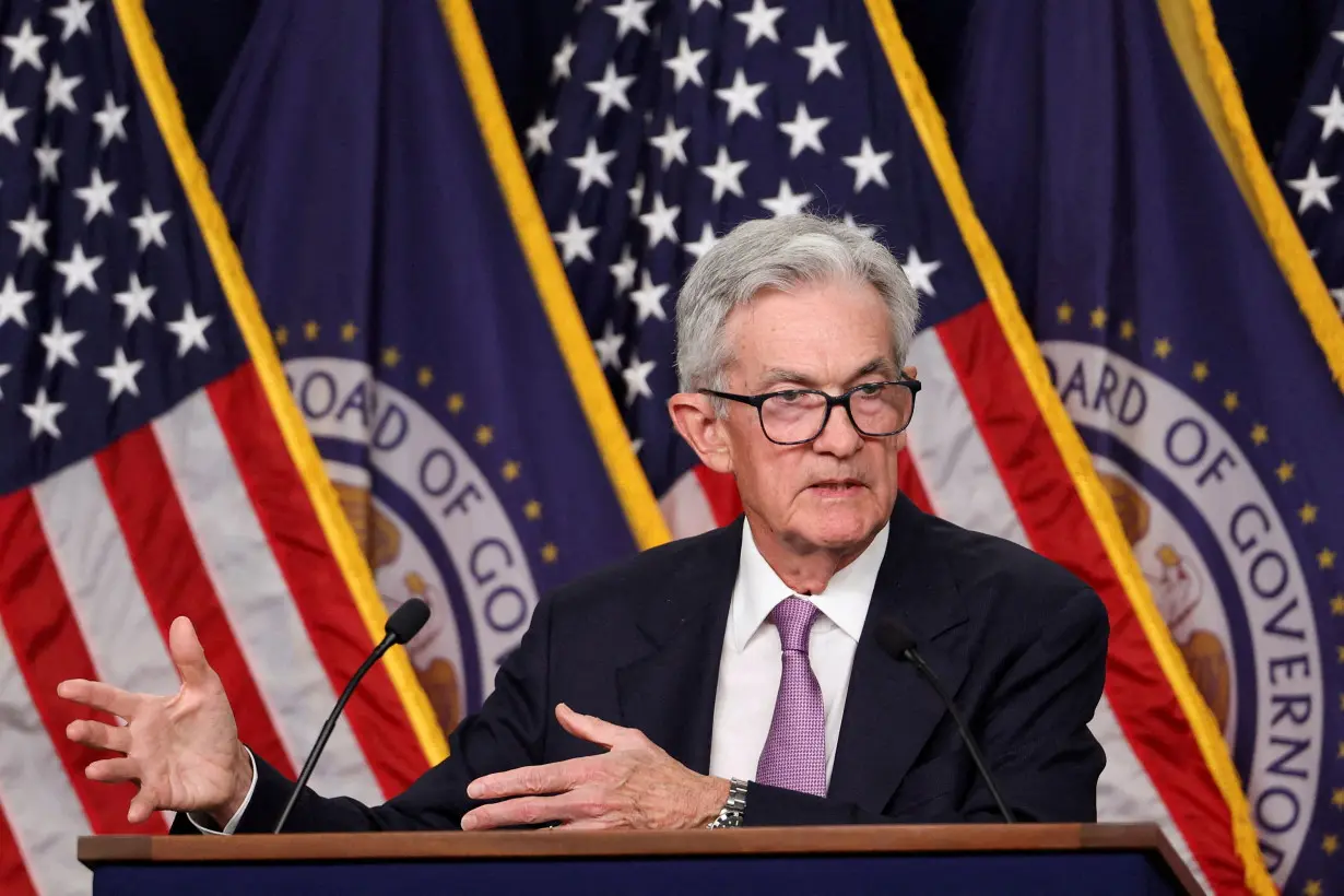 FILE PHOTO: Jerome Powell holds a press conference following a two-day meeting of the Federal Open Market Committee on interest rate policy in Washington