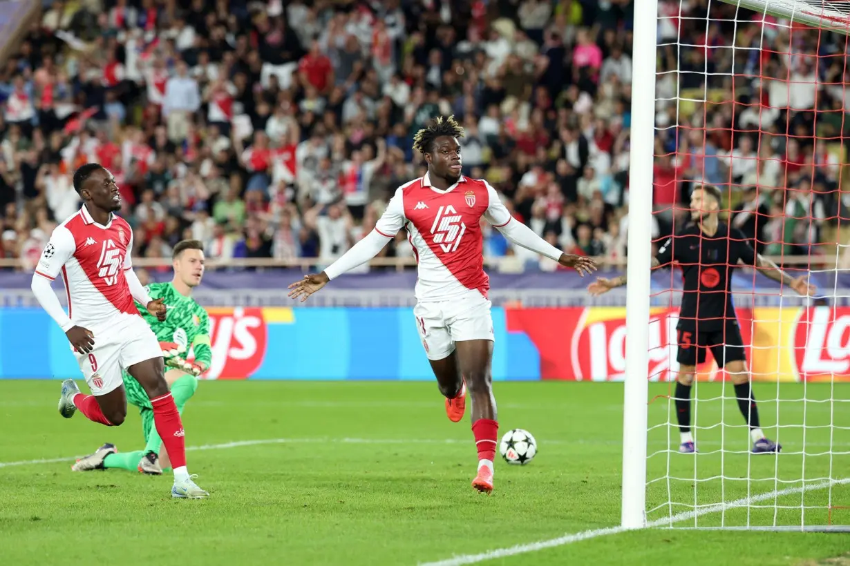 Monaco's George Ilenikhena celebrates after scoring against Barcelona at the Stade Louis II.