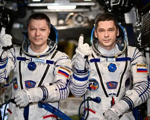 2 Russians set record for longest single stay on the International Space Station