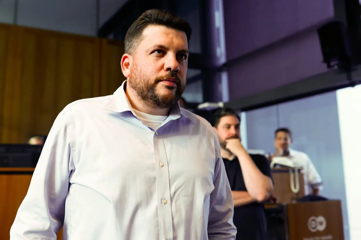 Russian dissidents Ilya Yashin, Vladimir Kara-Murza and Andrei Pivovarov hold a press conference after being freed, in Bonn