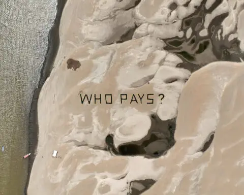 'Who pays?' asks Brazil Greenpeace protest on climate impact in the Amazon