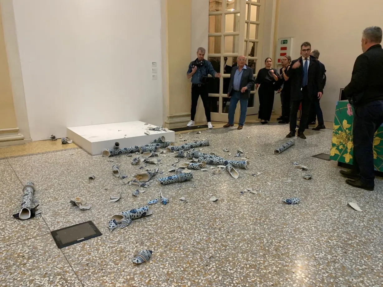 A man shattered a sculpture by Ai Weiwei during the opening exhibition in Bologna