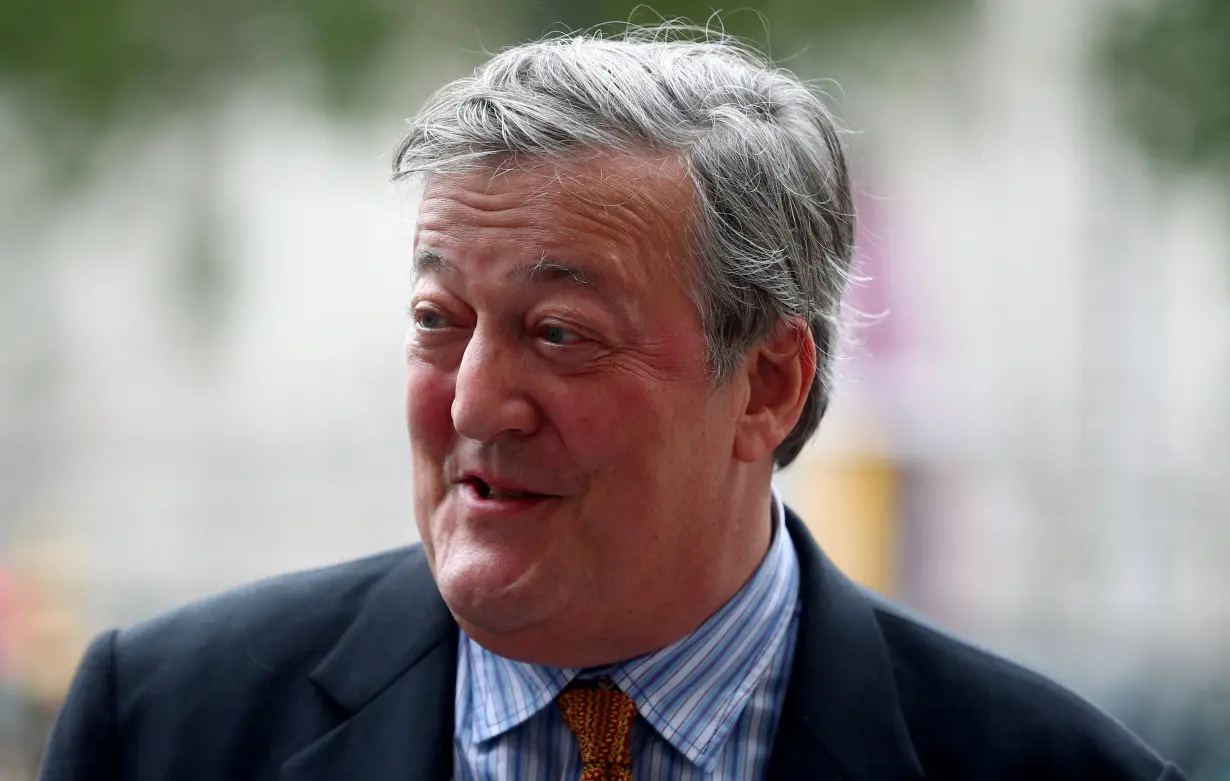 FILE PHOTO: Actor Stephen Fry attends a Service of Thanksgiving for Sir Peter Hall at Westminster Abbey in London