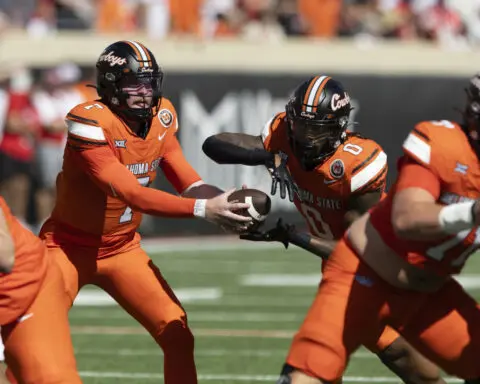 Bernard runs for 182 yards and No. 12 Utah wins Big 12 debut, beating No. 14 Oklahoma State 22-19