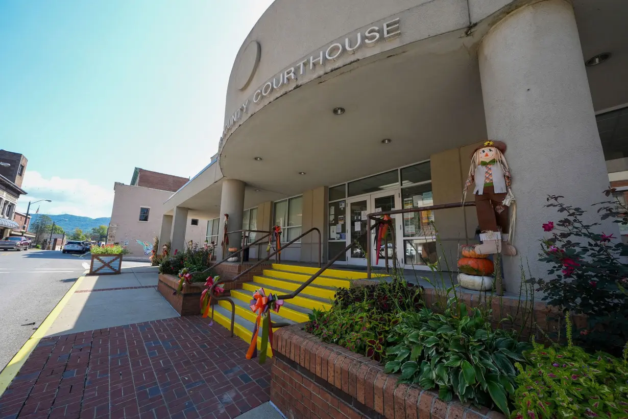 Signs indicate that the Letcher County Courthouse is closed on Friday, September 20 in Whitesburg, Kentucky.