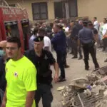 Building collapse in Italy kills 2 young siblings and their mother