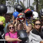 An estimated 180,000 motorcyclists converge at Portuguese shrine to have their helmets blessed.