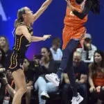 Thomas' triple-double leads Connecticut to win over Indiana and Caitlin Clark in WNBA playoff opener