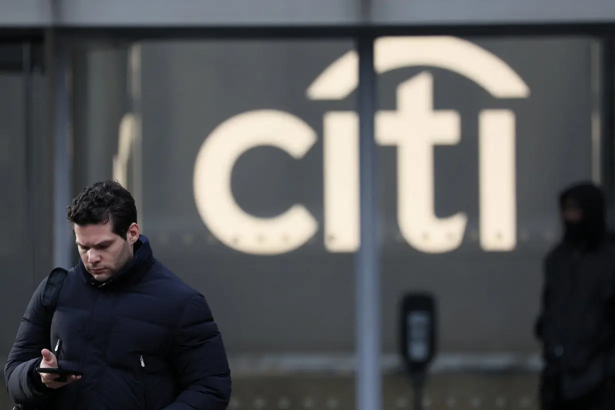 Workers exit the Citi Headquarters in New York