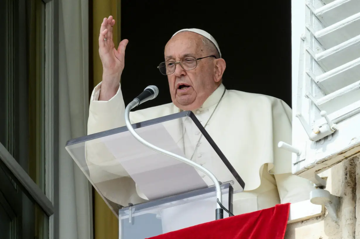 Pope Francis leads Angelus prayer from his window at the Vatican