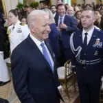 As he welcomes Gotham FC, Biden says 'a woman can do anything a man can do,' including be president