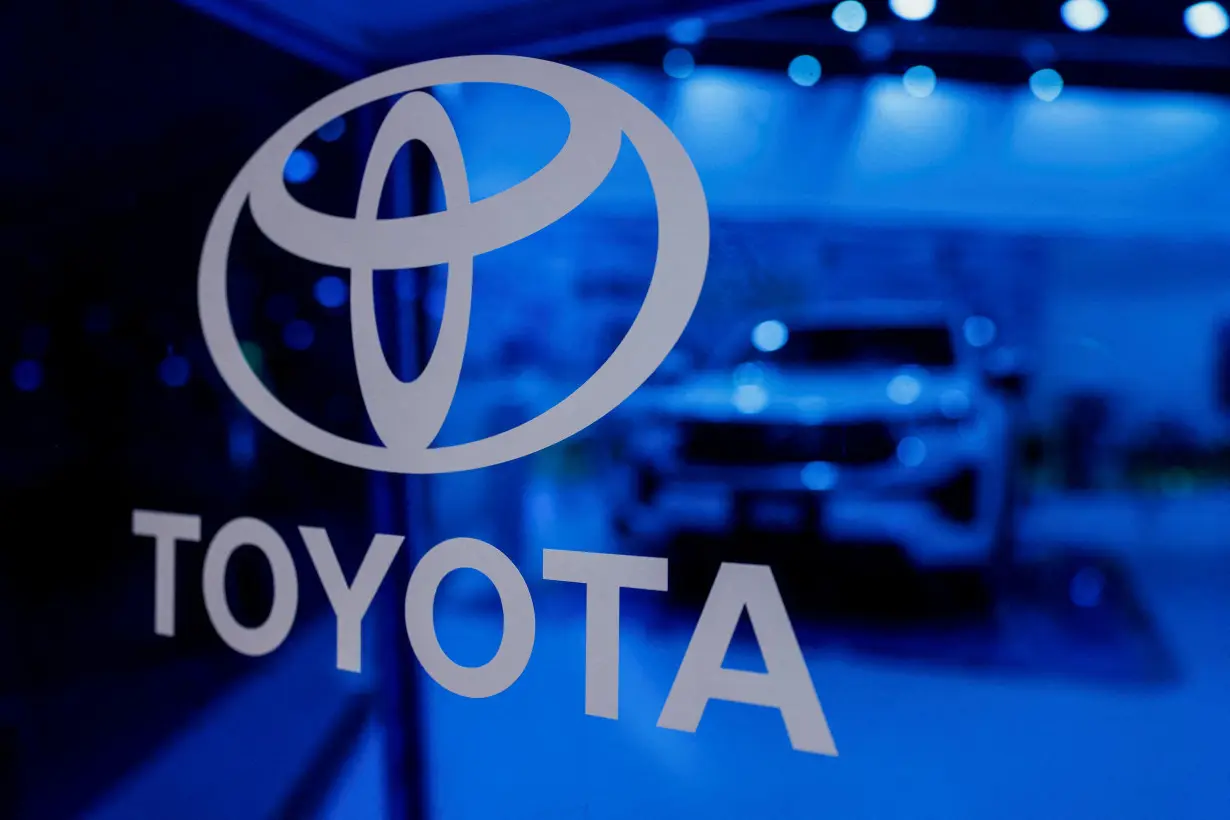 FILE PHOTO: Toyota's logo is seen in their exhibition stall at Bharat Mobility Global Expo organised by India's commerce ministry at Pragati Maidan in New Delhi