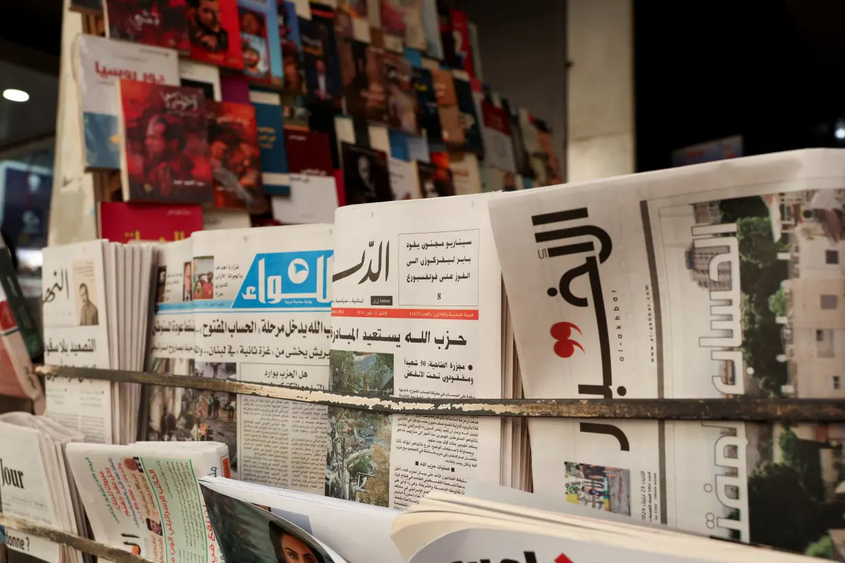 Copies of newspapers are displayed for sale in Beirut