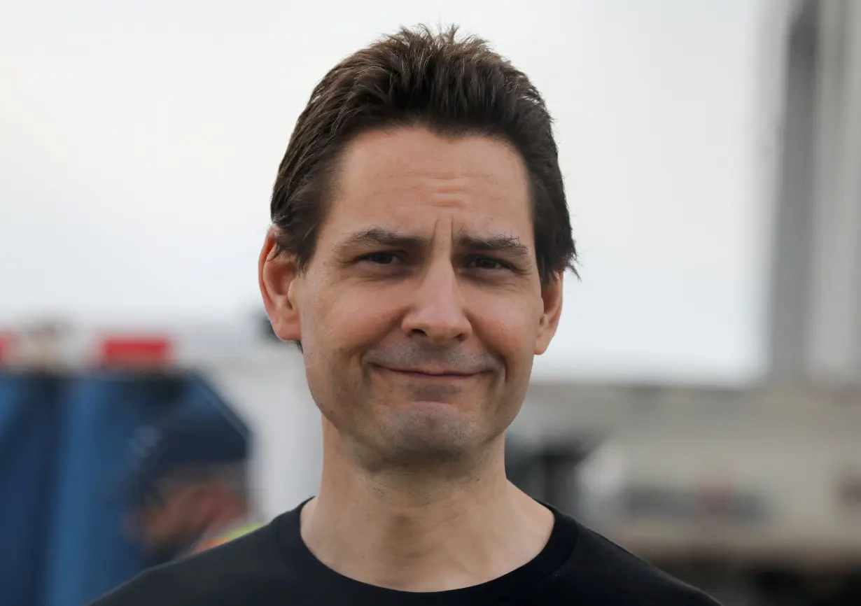 FILE PHOTO: Former diplomat Michael Kovrig arrives on a Canadian air force jet at Pearson International Airport in Toronto