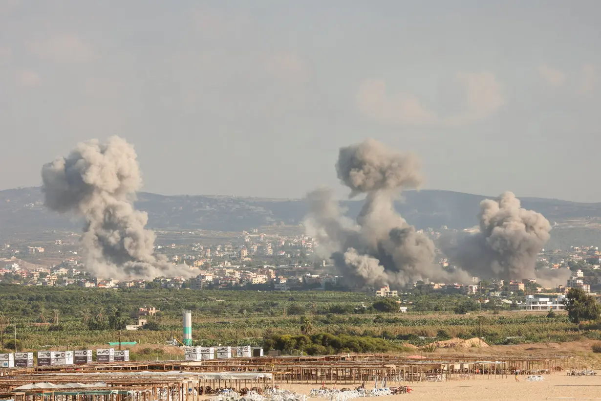 Smokes rise, amid ongoing cross-border hostilities between Hezbollah and Israeli forces, in Tyre