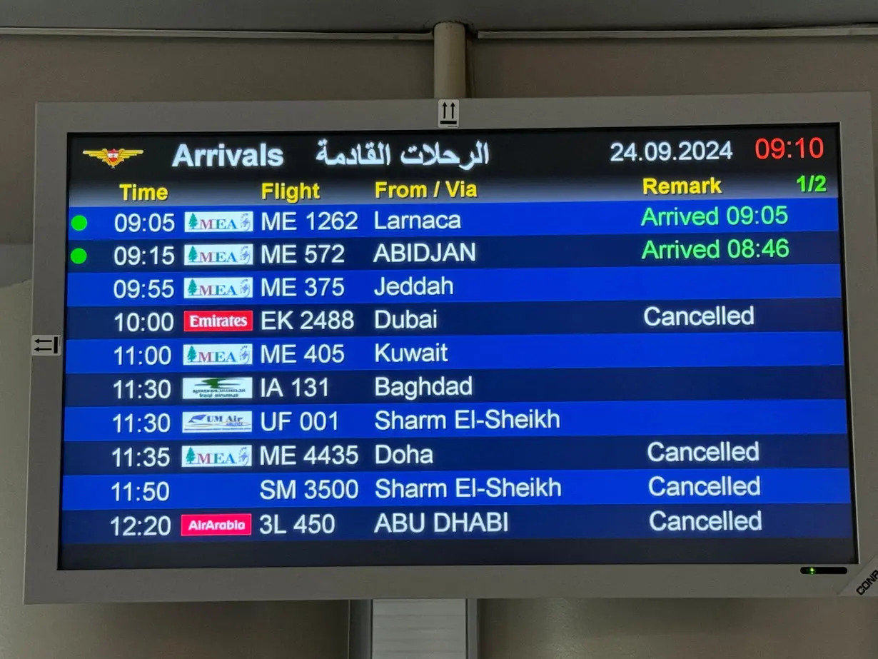 An information board shows some cancelled flights, at the Beirut-Rafic Hariri International Airport