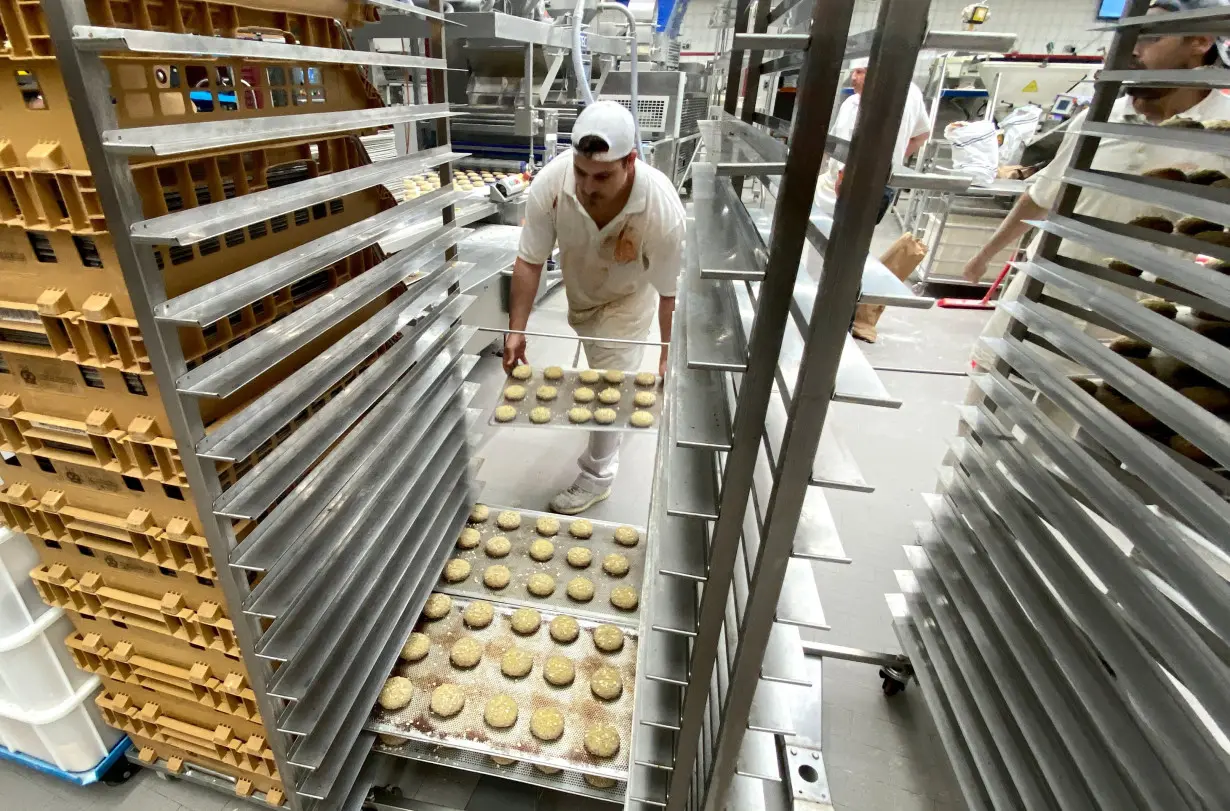 Staff work at a bakery in Muelheim an der Ruhr