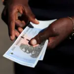 Zimbabwe's retailers warn of store closures over exchange rate