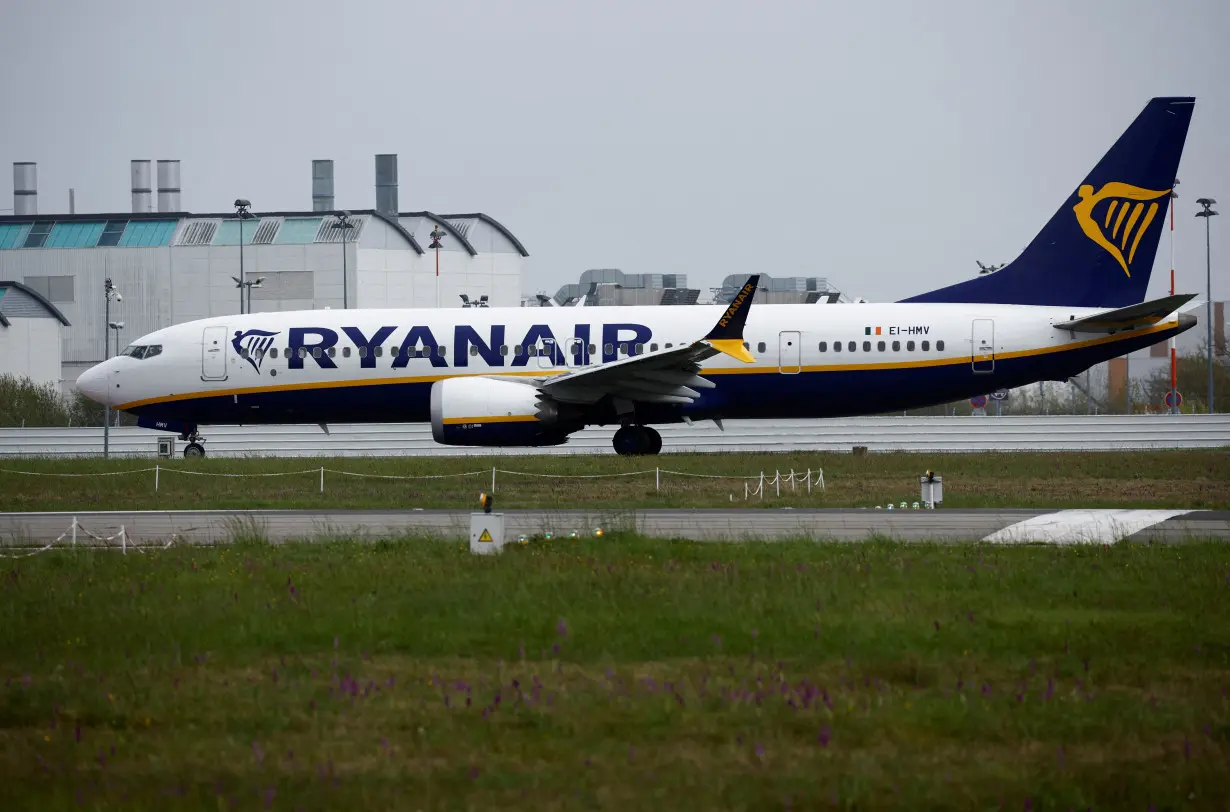 FILE PHOTO: A Ryanair Boeing 737 MAX 8-200 Aircraft prepares to take off from the Nantes Atlantique Airport in Bouguenais