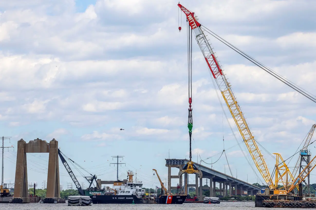 Clean-up continues as Baltimore's main shipping channel prepares to reopen following the collapse of the Francis Scott Key Bridge