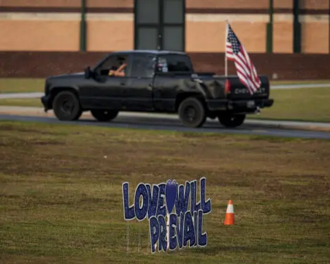 Weeks after a school shooting, students return for classes at Apalachee High School