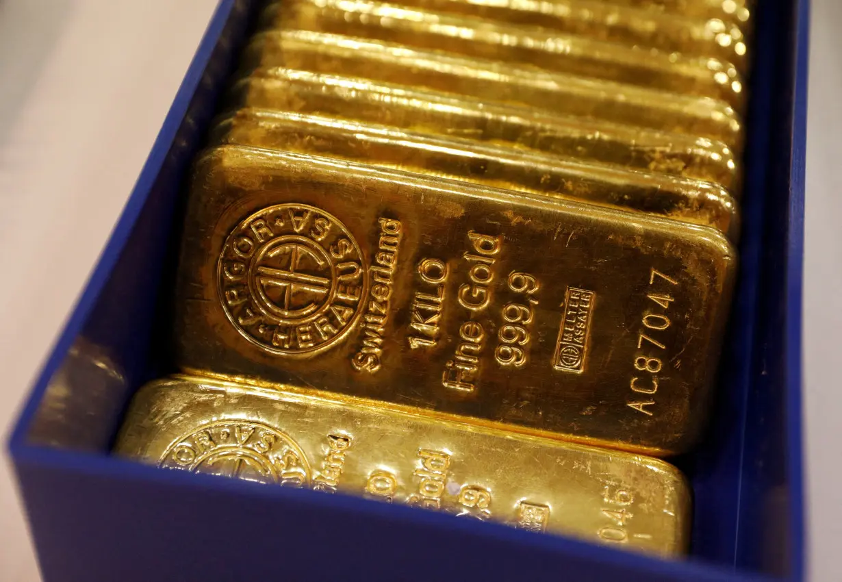 FILE PHOTO: Gold bullions are displayed at GoldSilver Central's office in Singapore