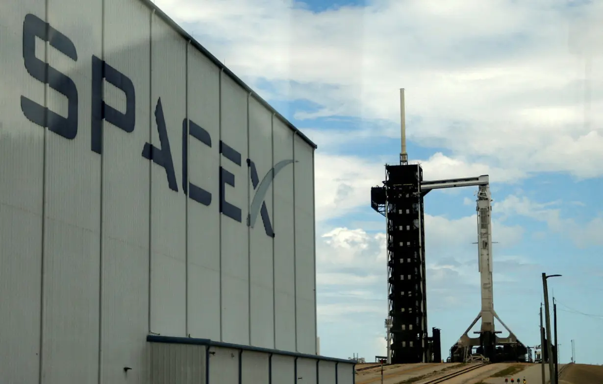 FILE PHOTO: A SpaceX Falcon 9 rocket is prepared for launch of Polaris Dawn, a private human spaceflight mission, at the Kennedy Space Center in Cape Canaveral