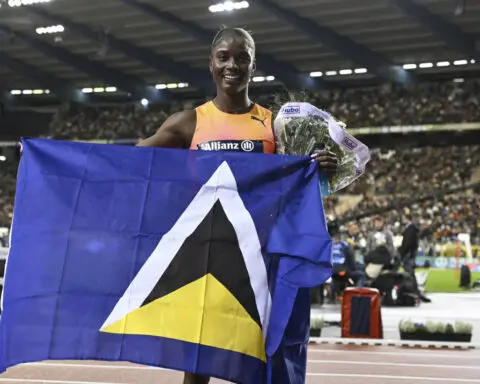 St. Lucia's first Olympic medalist returns home to cheers and calypso