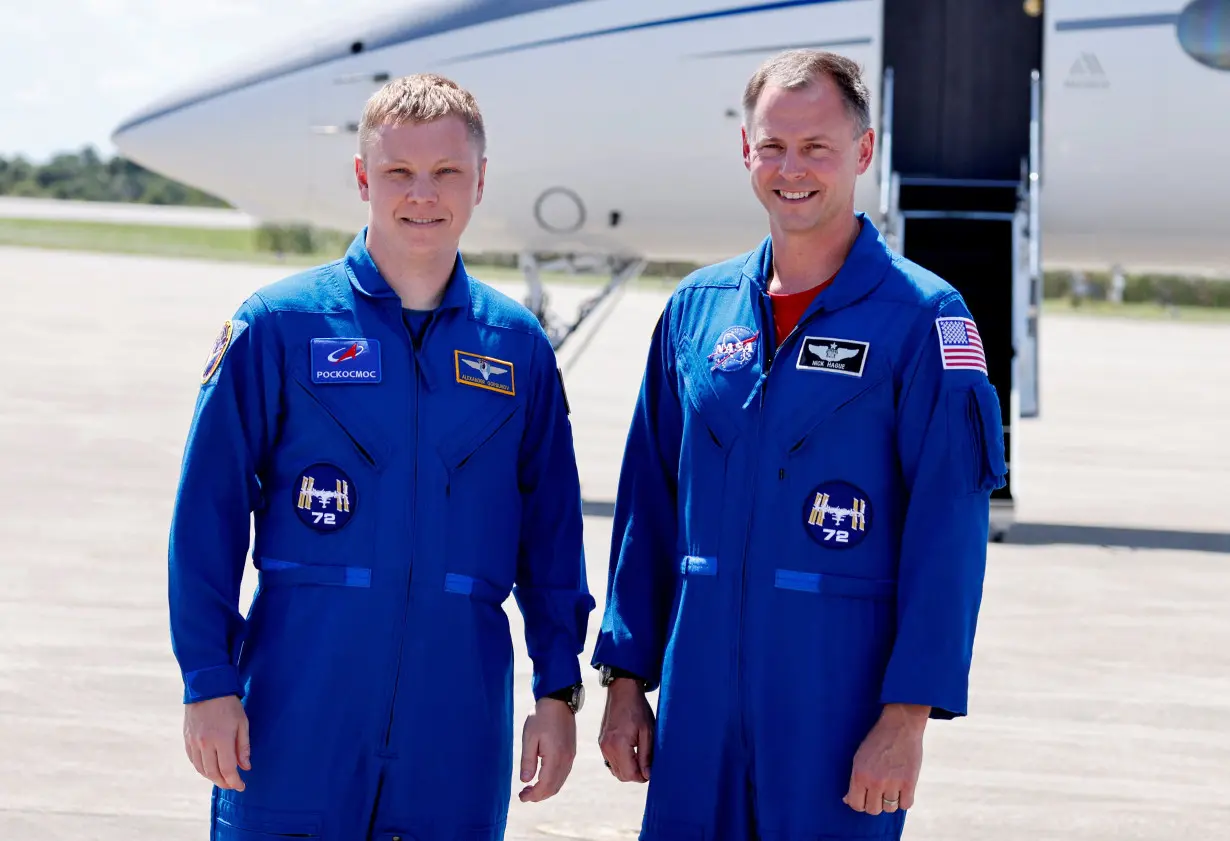 NASA's Crew-9 astronaut Nick Hague and Roscosmos cosmonaut Alexander Gorbunov arrive at the Kennedy Space Center ahead of their launch to the International Space Station