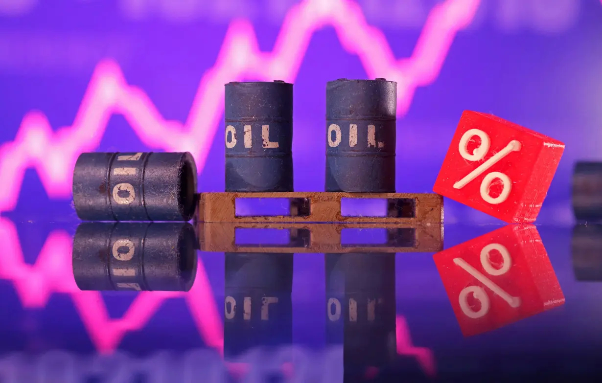 Illustration shows miniatures of oil barrels and rising stock graph