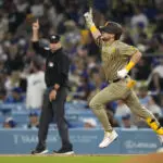 Padres turn triple play to clinch playoff spot with 4-2 win over Dodgers