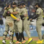 Padres turn triple play to clinch playoff spot with 4-2 win over Dodgers